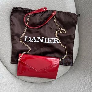 Danier Leather, excellent used condition. Dust bag included.